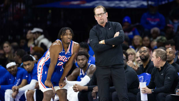 Philadelphia 76ers guard Tyrese Maxey and head coach Nick Nurse.